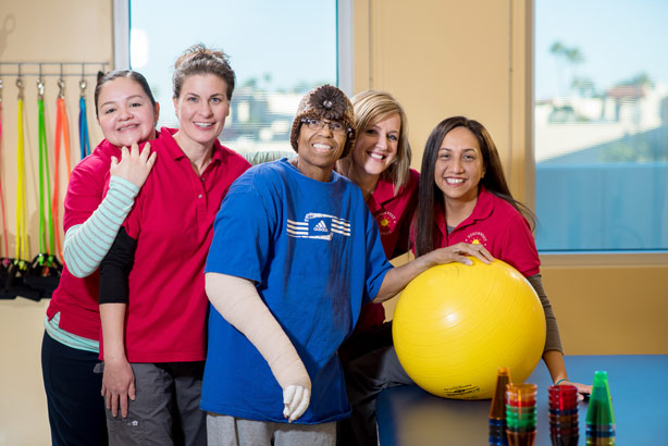 Southwest Rehabilitation staff with patient.